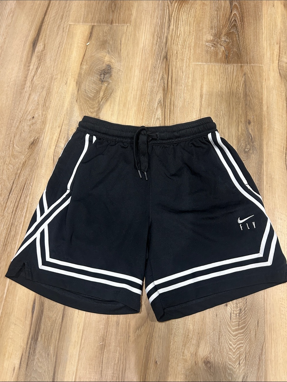 Nike Men’s Black Athletic Shorts with White Stripe Accents